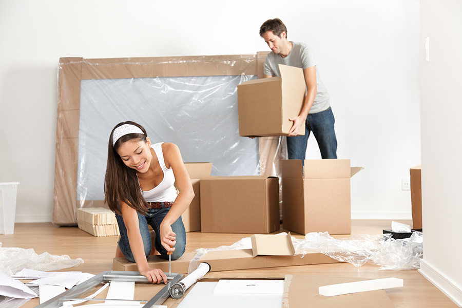 http://www.dreamstime.com/royalty-free-stock-photography-couple-moving-new-home-house-image29451647